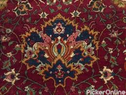 Taj Carpets